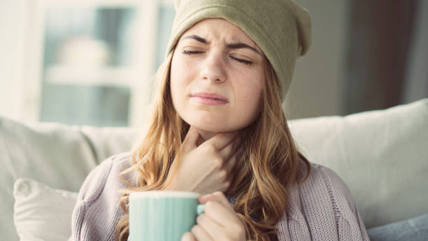 A pregnant woman with soar throat