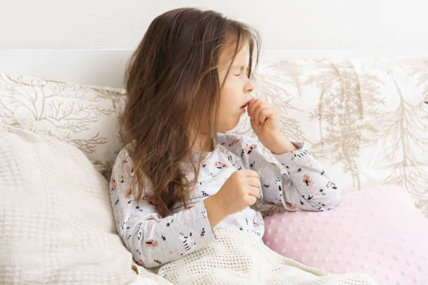 A kid suffering from severe cough
