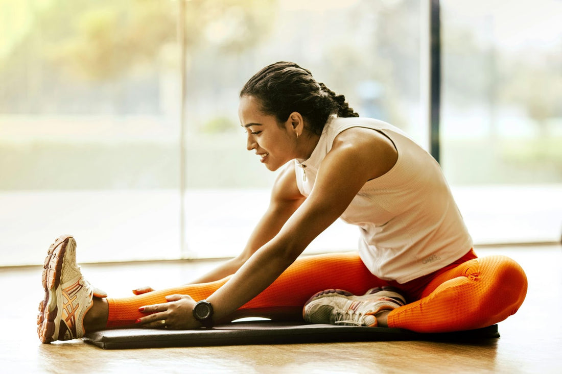 Woman Stretching in Exercise Outfit