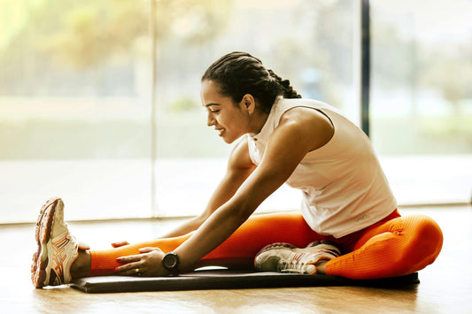 Woman Stretching in Exercise Outfit