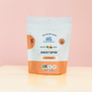 A stand-up pouch of MommaBear Small Batch Honey lollipops Immunity Support  in Pineapple & cherry flavor. The packaging is white with a peach-orange bottom section 