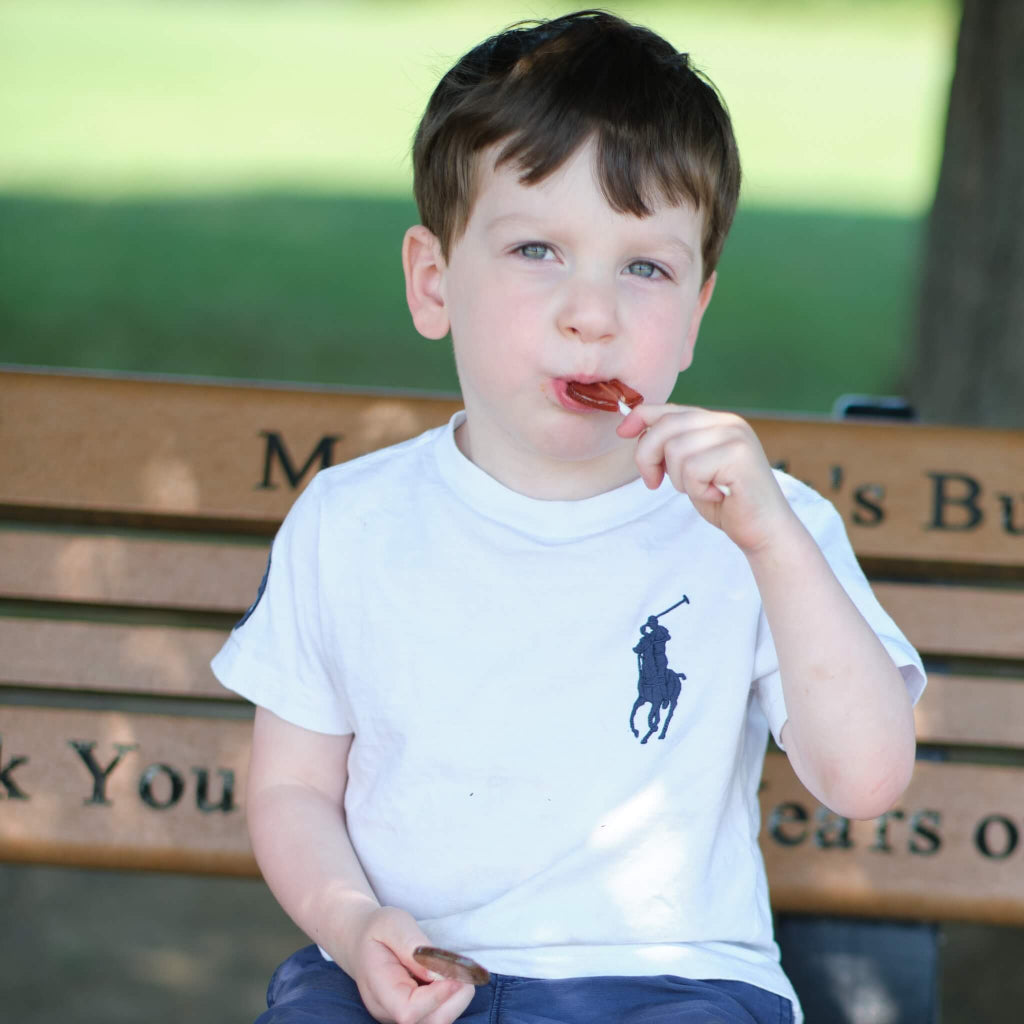 MommaBear Organics immunity support lollipop enjoyed by child